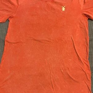 Dutch Bros short sleeve T-shirt. Never worn. Fun colors!